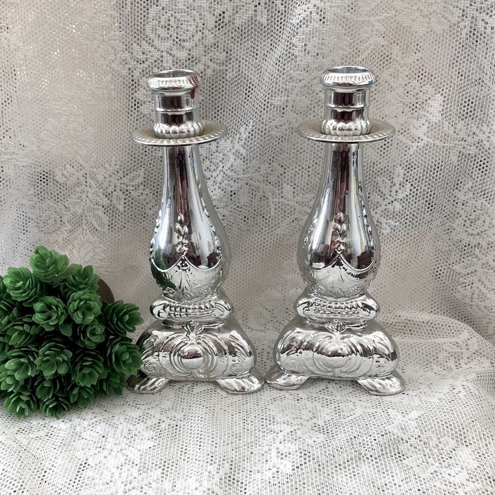 Pair of Vintage Avon glass/plastic silver coated bottle/ candlestick holders